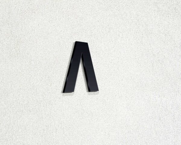 Photorealistic 3D Wall Logo Mockup by GraphicsFamily