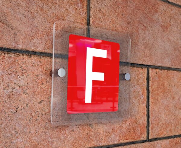 Glass sign plate on white wall Mockup
