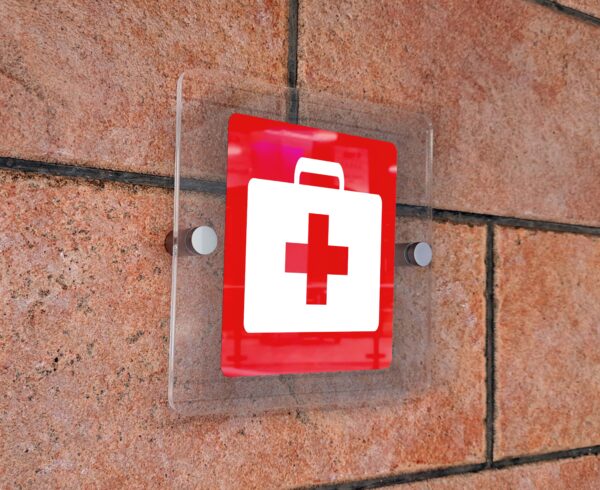 Glass sign plate on white wall Mockup